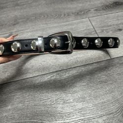Benny Studded Leather Belt by the luxury brand KHAITE.