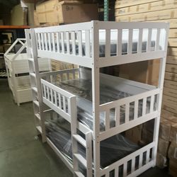 Triple bunk bed. Available in white & espresso. Assembly required. Assembly not included. Taxes included. Free delivery.  Bunk bed only-$450 Bunk bed 
