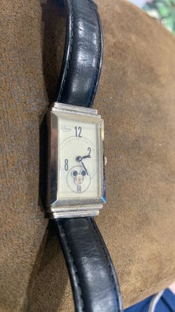 vintage Disney Quartz Mickey Mouse "Tank" watch with a rotating Mickey face