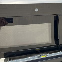 New GE Over The Range Microwave With Venting & Light