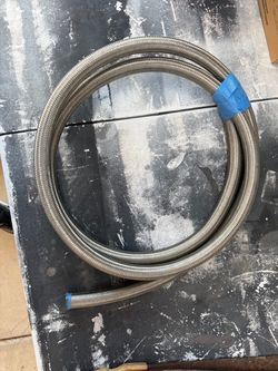 3/4 inch braided fuel line. About 6-7feet