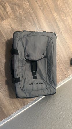 Oakley suitcase w/ wheels