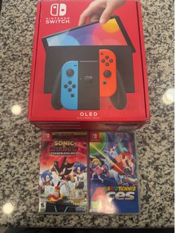 Nintendo Switch OLED w/ 2 games