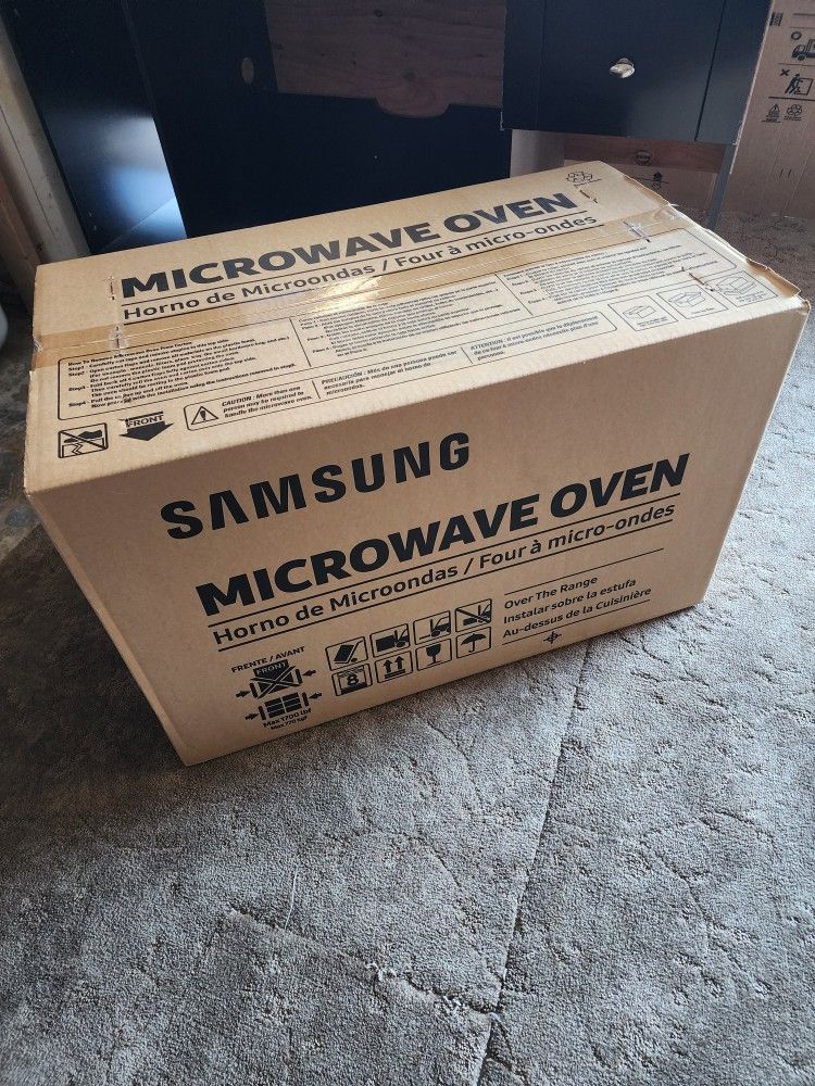 Brand new Samsung 1.9 Cu.ft. Over The Range Microwave Oven