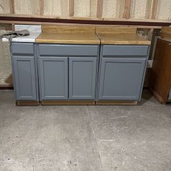 KITCHEN OR LAUNDRY CABINETS