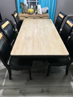 Marble table, six chairs, tv counter, and mirror