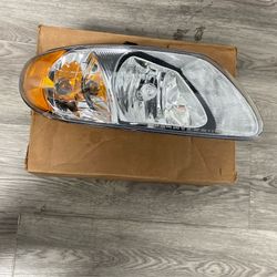 01-07 Chrysler Town and Country, Dodge Caravan New Genuine Right Passenger side Headlight 0(contact info removed)AC