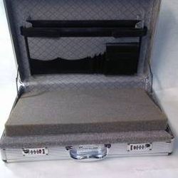 10 New Aluminum Frame Briefcases with foam Inserts $80.00 for all 10. 