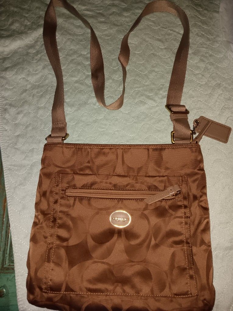 Coach Nylo Crossbody In Brown