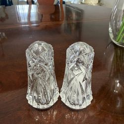 Vintage pressed cut glass salt and pepper shaker set.