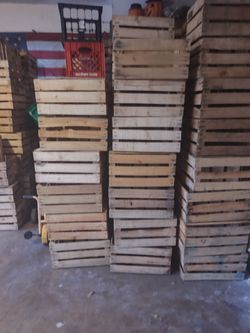 Wooden crates 19x13x9 excellent condition $2.  Milk crates $3 color one