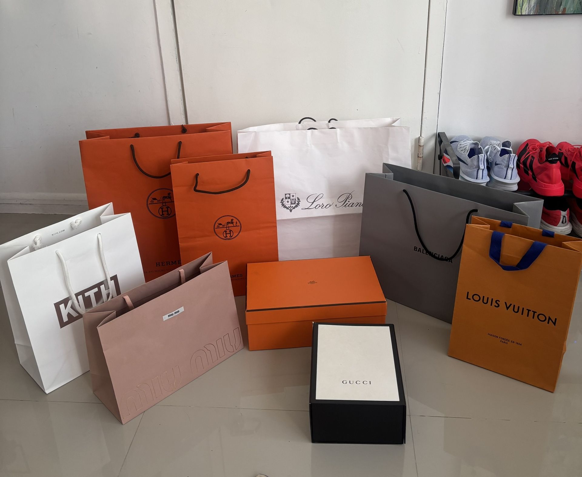 Bundle of CHANEL BALENCIAGA KITH GUCCI MIU MIU HERMES Shoppers & Boxes