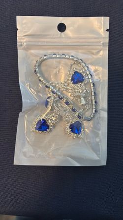 Designer, elegant jewelry with necklace, earrings, bracelet, and ring