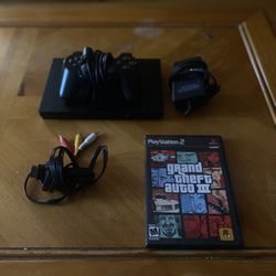 PS2 slim including GTA 3 (all cords come with)