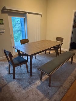 Caleb Dining Table Set, Dining Bench and 3 chair. Nothing broken or scratched. Paid $1600. Still have the receipt