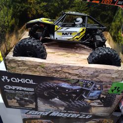 RC electric rock crawler with a front and rear steering