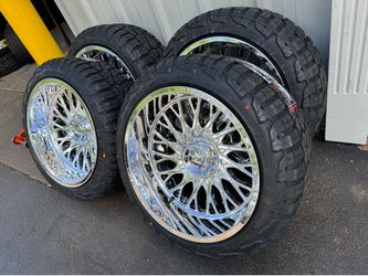 NEW 22x12 mirror chrome fittipaldi wheels wrapped in 285/45r22 RBP tires