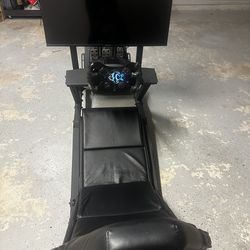 Next Level Racing Simulator Cockpit and Logitech G923 Wheel and Pedals