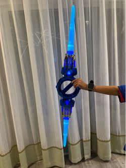Double-Edged Light Sword Toy with LED Lights and Combat Sound Effects, Wrist-Activated Rotating Action Role Play Saber for Kids and Teens, Motion-Sens