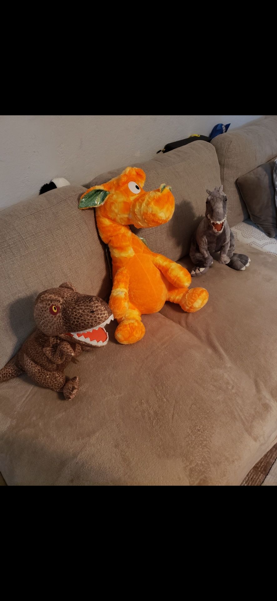 3 Dino stuffed animals