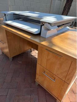 Free Office desk with separate Ergotron standing desk
