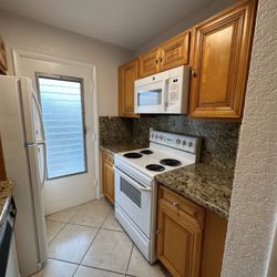 White Set Of Appliances Good Condition New Stainless Ones On The Way Do These Need To Go.  Includes Microwave, Stove/range, Dishwasher & 30”fridge 