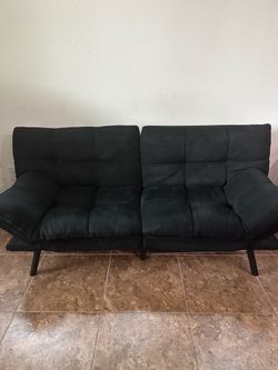 A black futon  bed