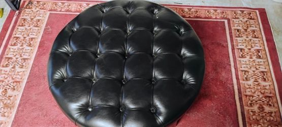 Black and wood ottoman