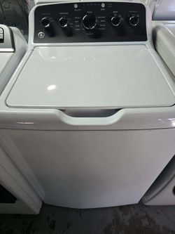 GE (4.5cu.ft.) capacity top-load washer with a stainless steel basket basket, features Cold Plus, and Wash Boost.