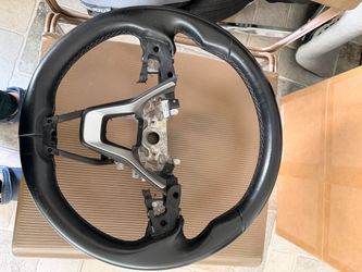 Black Leather Steering Wheel with Silver Trim