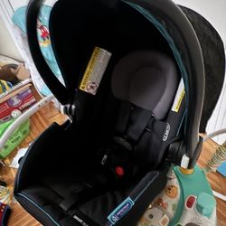 Graco SnugRide Lite LX Infant Car Seat. 