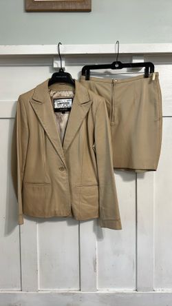 Wilson’s Leather Jacket And Skirt