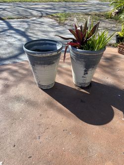 2 Planter Pots At 20 Dollars Each One