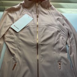 Pink lululemon define jacket with Gold zipper 
