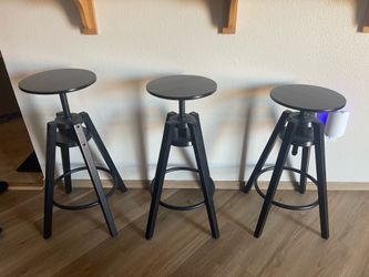 3 adjustable bar stools Sold as a package.