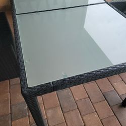 Reduced 59"×36" table glass and Wicker mint condition 1 year old used inside lanai paid $699 plus tax(no chairs)
