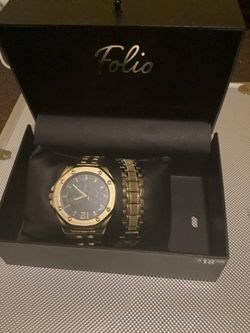 Gold And Black Watch And Bracelet 