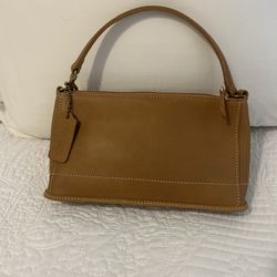 Coach tan leather pochette
