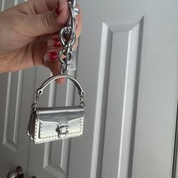 Coach bag charm 
