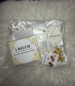 surprise packages of gold-colored garments