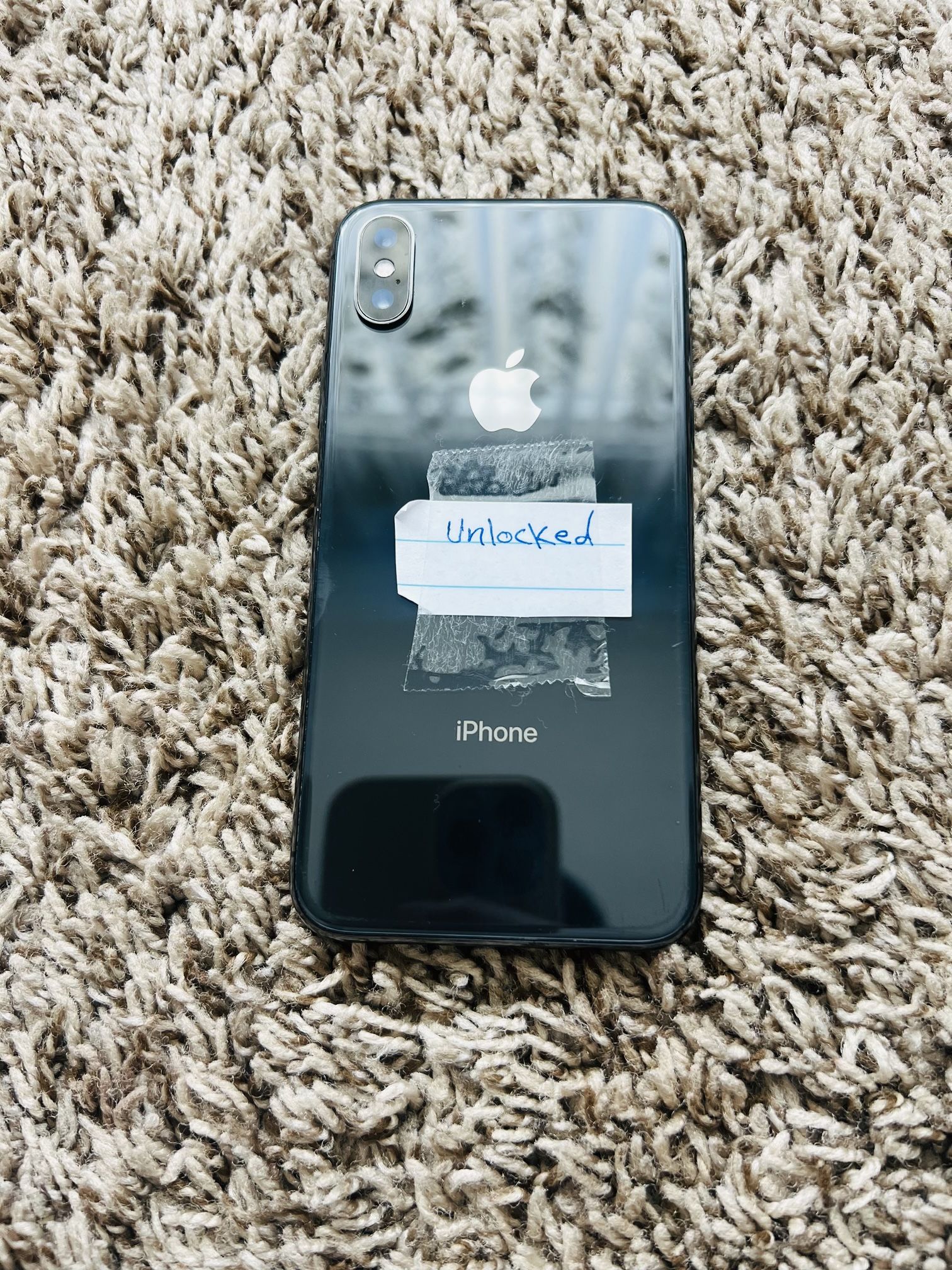 iPhone X 64gb unlocked (front cracked little bit)