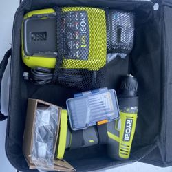 NEW Ryobi 12 V lithium drill with two batteries