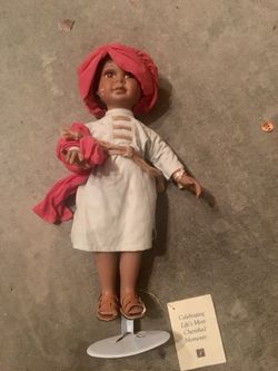 African Porcelain Doll Dressed In African Attire