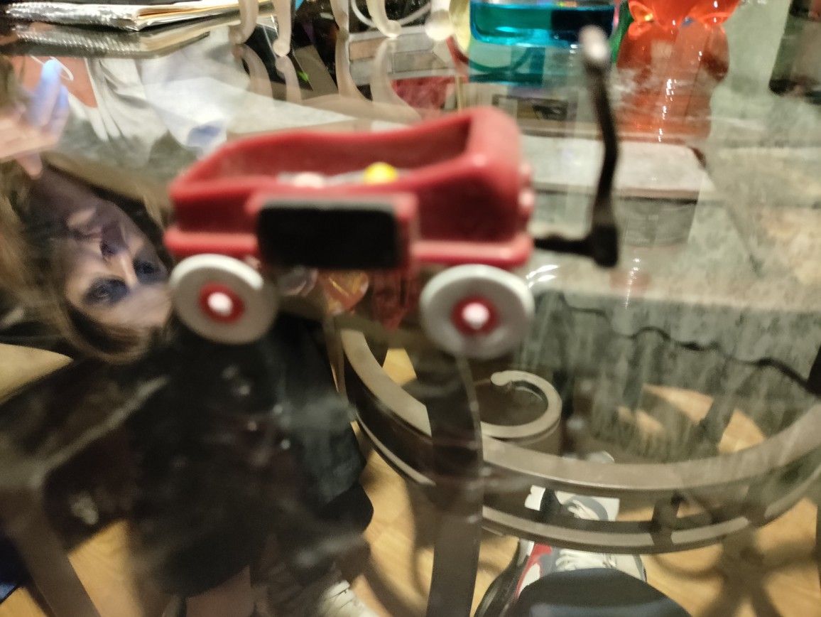 Vintage Radio Flyer Magnet With Ball ,Bat, And Racket In Back 