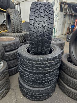Ser of four used tires 33x12.50-20 toyo