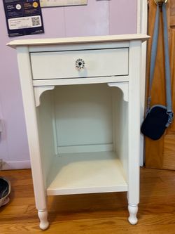 White wooden nightstand