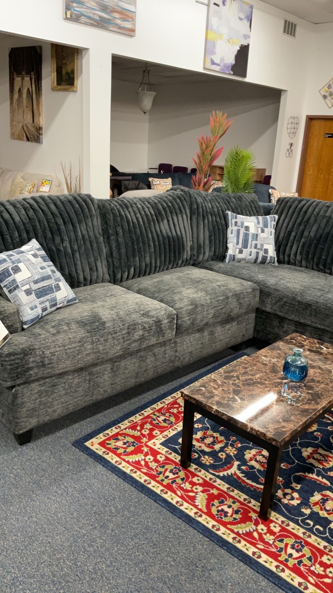Small sectional with fuzzy corduroy
