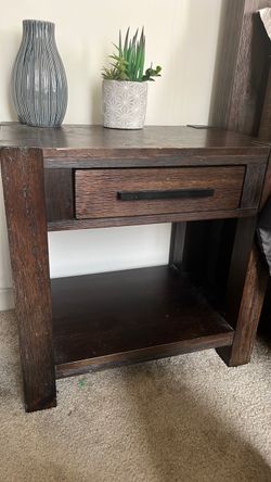 Brown night stand with sliding draw