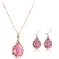 Beautiful gold color chain with pink pendent and earrings new