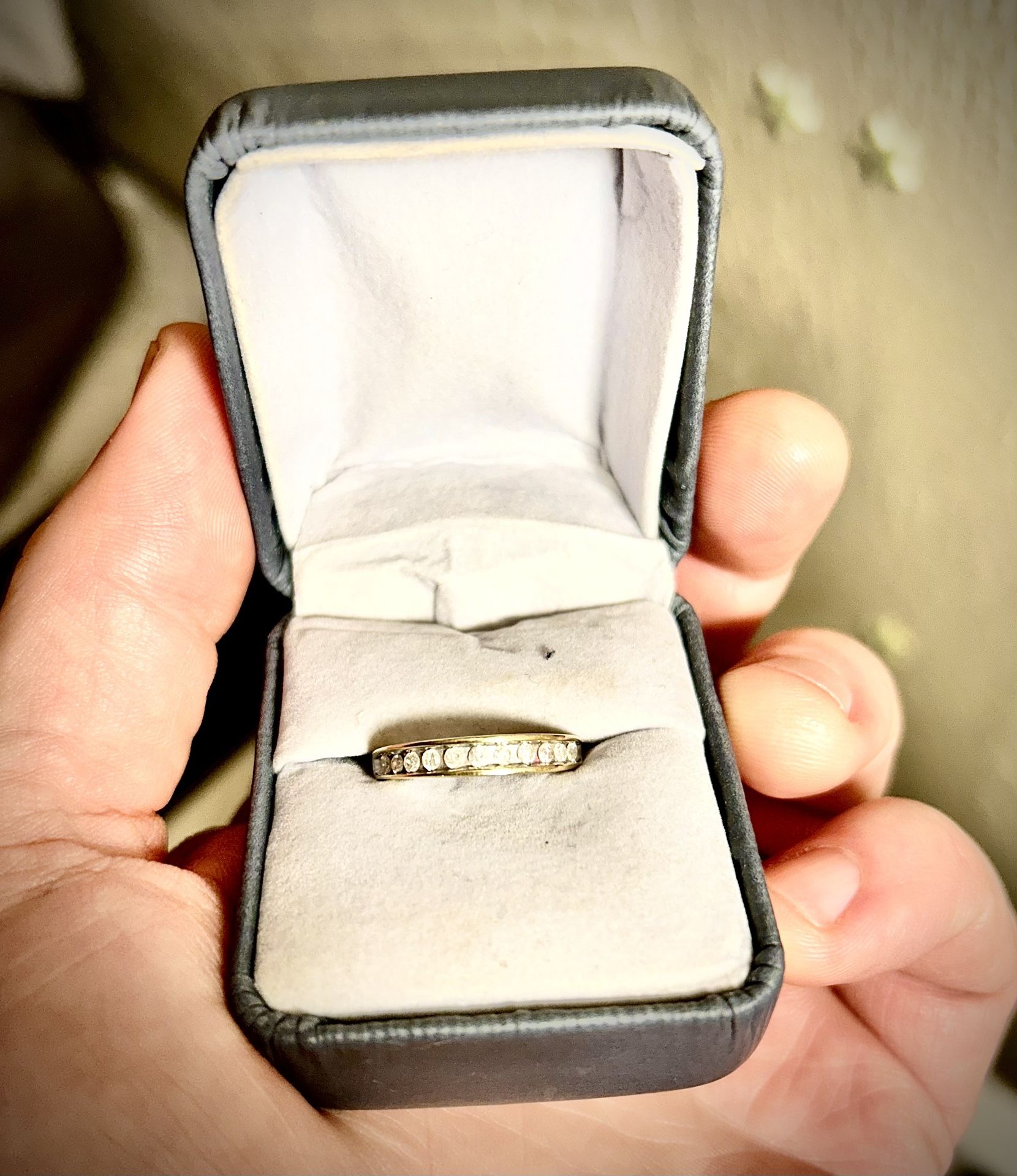 Stamped Gold Wedding band with a little under 1/2 kt of Diamonds